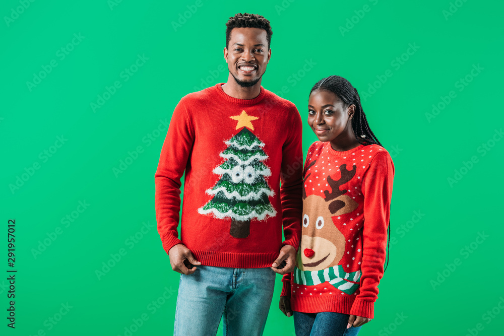 African American man near woman in red 