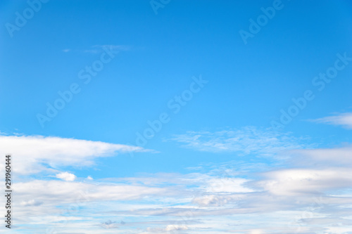 Fototapeta Naklejka Na Ścianę i Meble -  Clouds on a blue sky above the horizon on a cold autumn day.