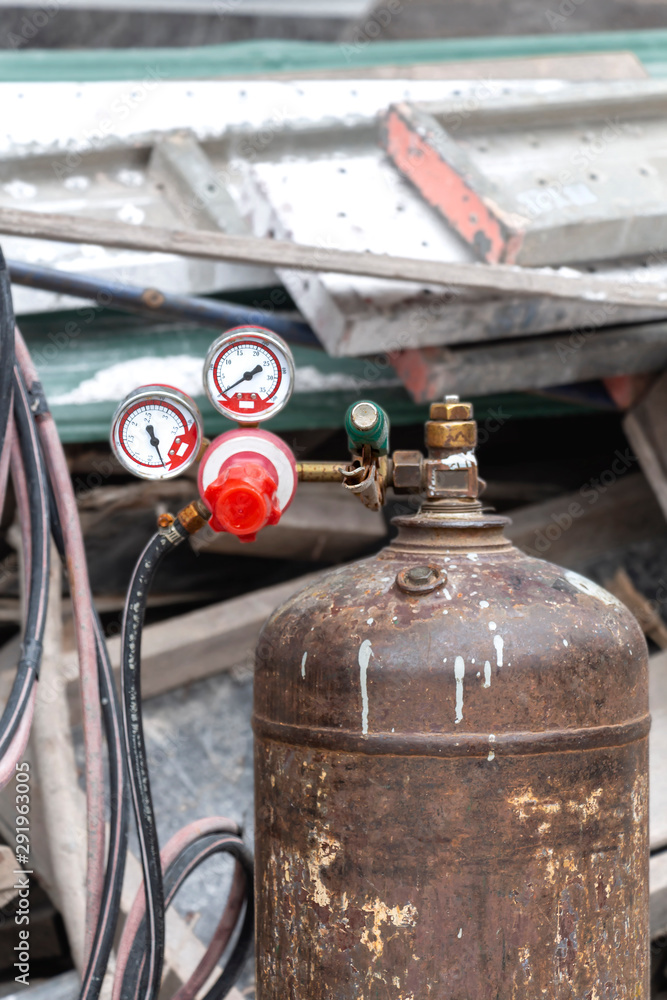 Pressure gauges on oxygen tank with valve of welding equipment acetylene gas cylinder for steel