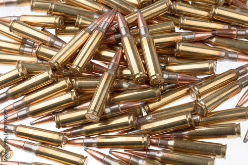Bullet isolated on white background. Rifle bullets close-up on white back. Cartridges for rifle and carbine.