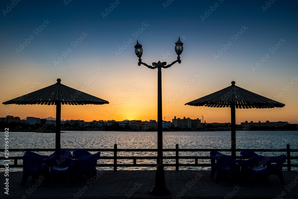 Sunset at the harbor park, Hurghada, east of Egypt