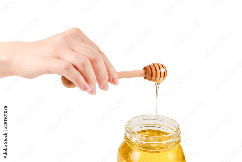 Dipper with honey in woman hand. Space for text or design. Dipper with honey in woman hand. Space for text or design.