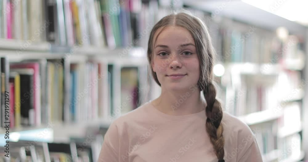 Portrait of high school student in library Portrait of high school student in library