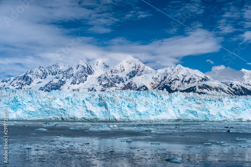 Amazing Hubbard Glacier. The View from the cruise ship in Alaska. Snow peaks and icebergs around.
