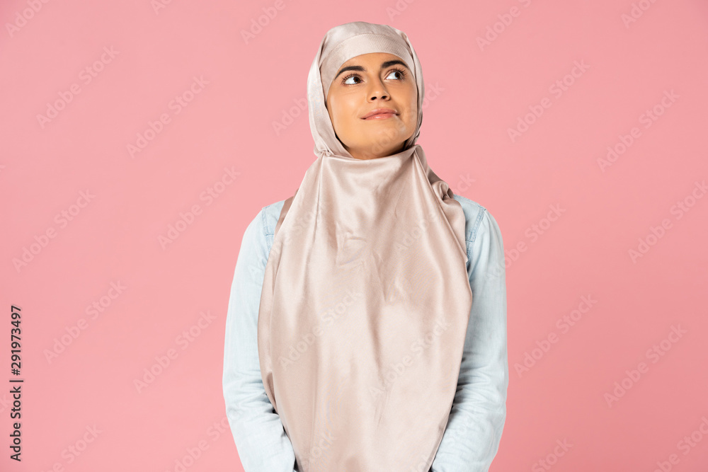 beautiful proud muslim girl in hijab, isolated on pink beautiful proud muslim girl in hijab, isolated on pink