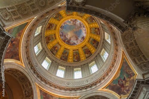 The beautiful interior of the hemispherical D  me des Invalides in Paris  painted by Charles de La Fosse with a Baroque illusion of space  sotto in su  over the tomb of Napoleon Bonaparte.