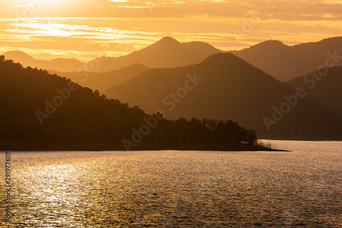 sunset travel landscape  jetty with mountains in the background