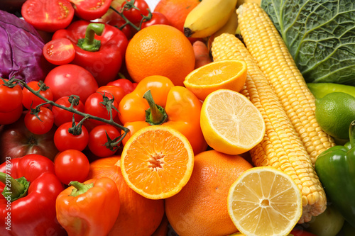 Fototapeta Naklejka Na Ścianę i Meble -  Ripe vegetables and fruits on whole background, close up