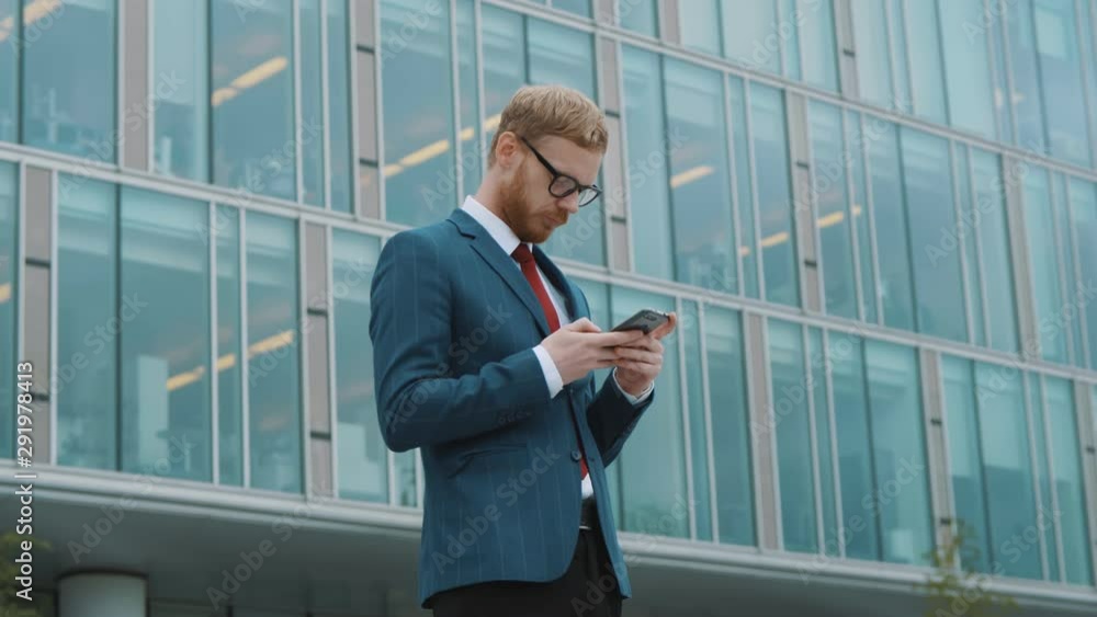 Entrepreneur texting his partner Entrepreneur texting his partner