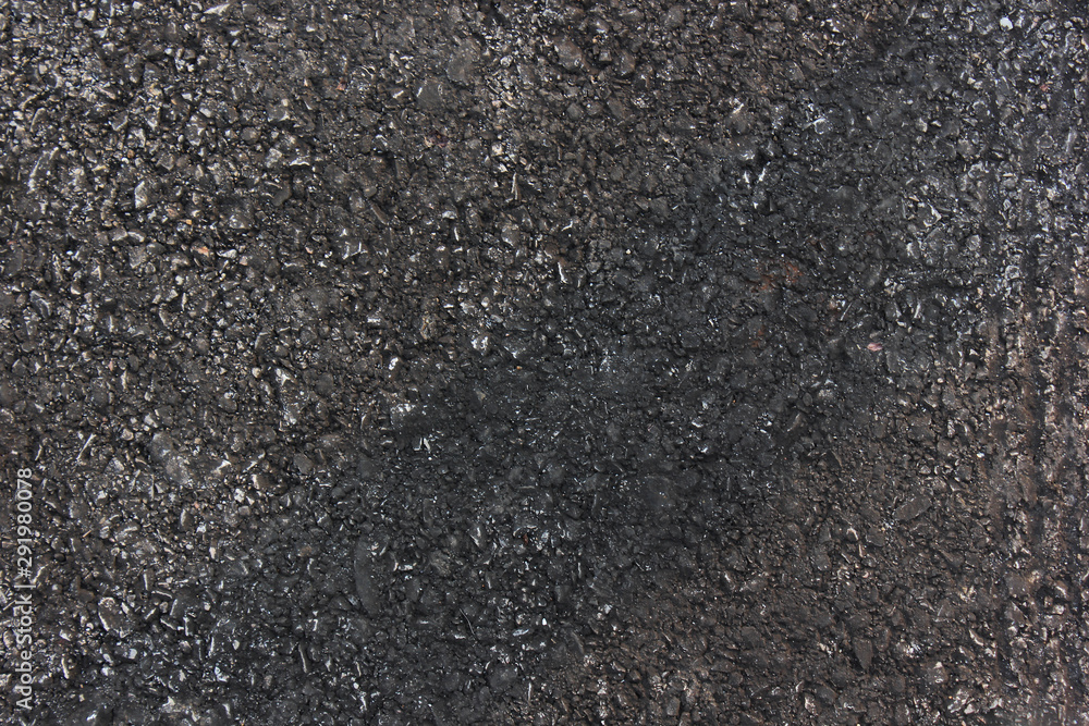Black asphalt texture background. Asphalt road micro detailed texture. Black asphalt texture background. Asphalt road micro detailed texture.