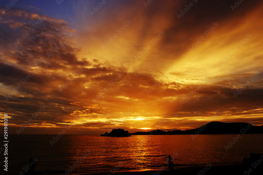 Sunset view by the sea on a bright day	