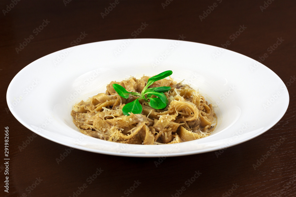 pasta with mazzarella cheese in a plate