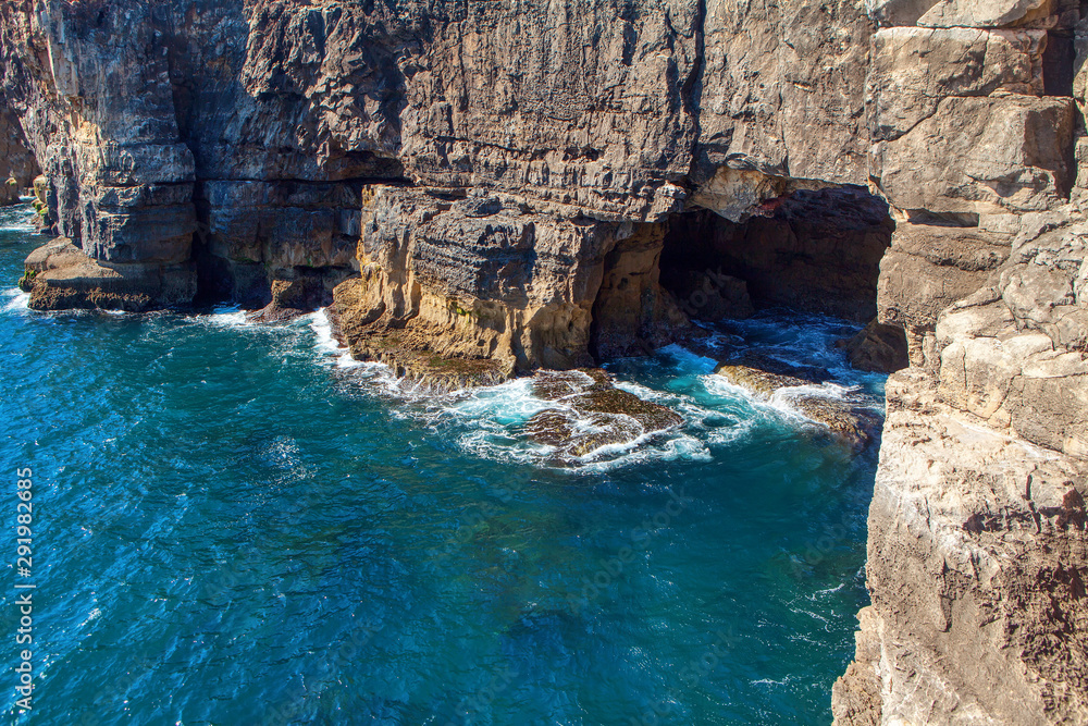 scenic cliffs and cave of Atlantic Ocean 