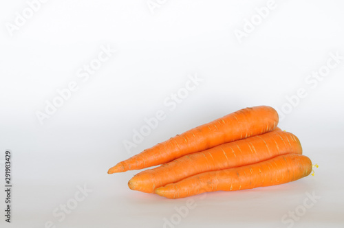 orange carrots on a white background