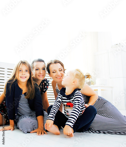 Mature sisters twins at home with little daughter  happy family smiling close up  lifestyle modern real people concept