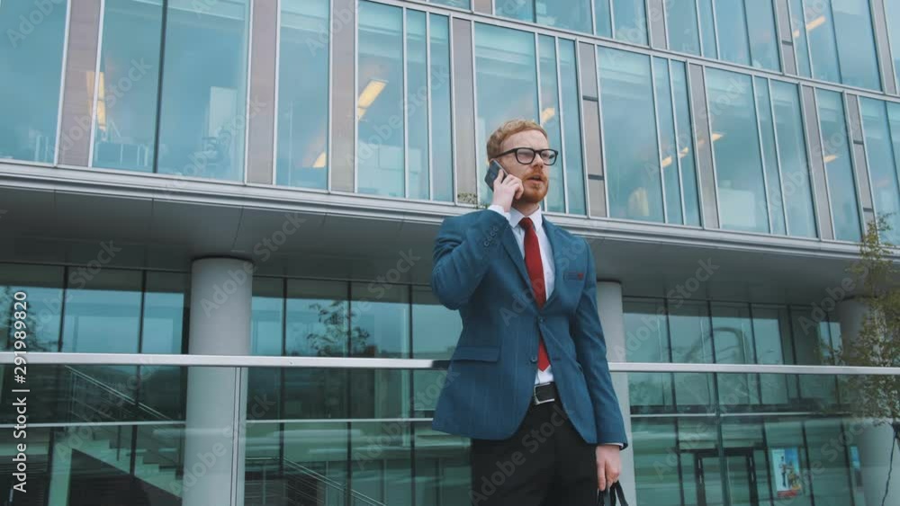 Entrepreneur talking with client on phone Entrepreneur talking with client on phone