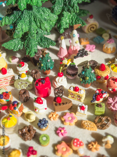 Merry Chrismas with a lot of miniature toys. Sweet party, dessert table toy concept. © pattawin
