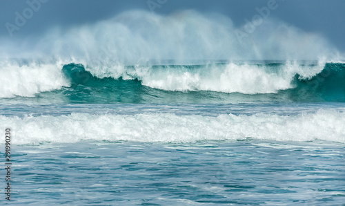 Photography Rolling turquoise surf breaks at Fistral beach in Cornwall