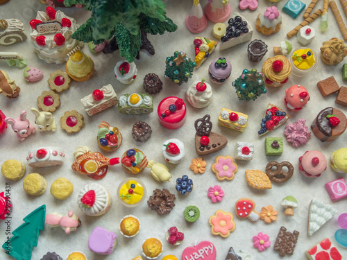 Merry Chrismas with a lot of miniature toys. Sweet party, dessert table toy concept.