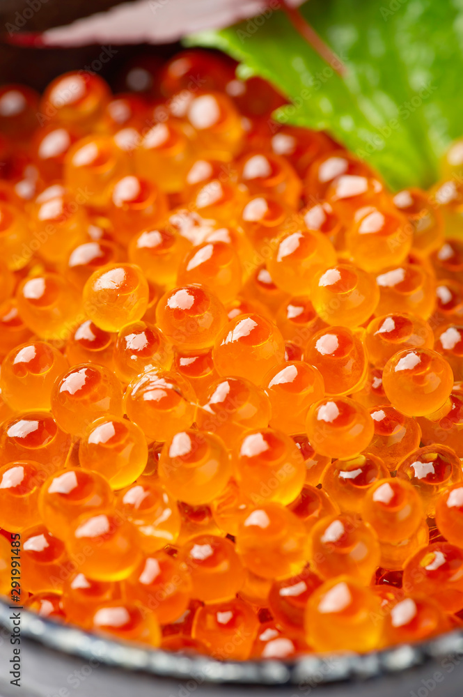 Ikura (salmon roe, red caviar, salmon caviar) in lighting studio . Ikura (salmon roe, red caviar, salmon caviar) in lighting studio .
