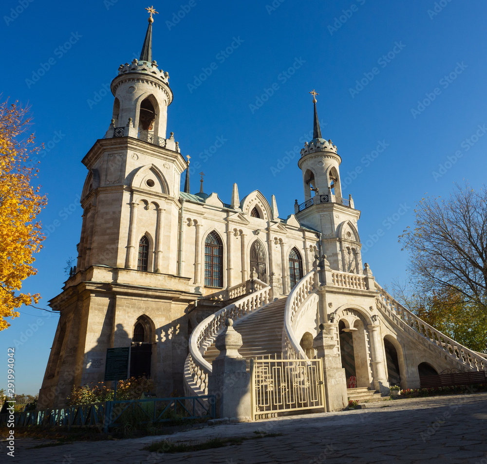 Obraz premium Orthodox church of the 18th century. General view of the temple. Pseudo-Gothic style of architecture. Blue sky background.