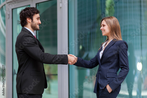 Businesspeople handshaking outdoor, meeting and agreement concept