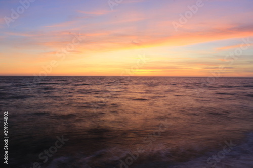 Sunset over the sea © Dan
