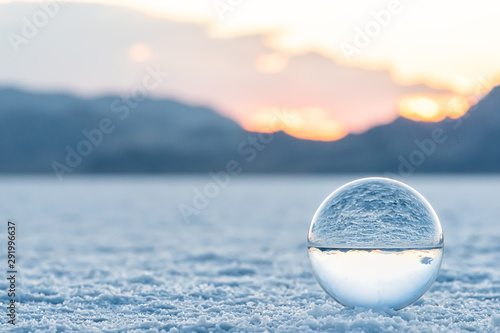Bonneville Salt Flats low angle ground level landscape view near Salt Lake City, Utah and sand texture with crystal ball reflection photo