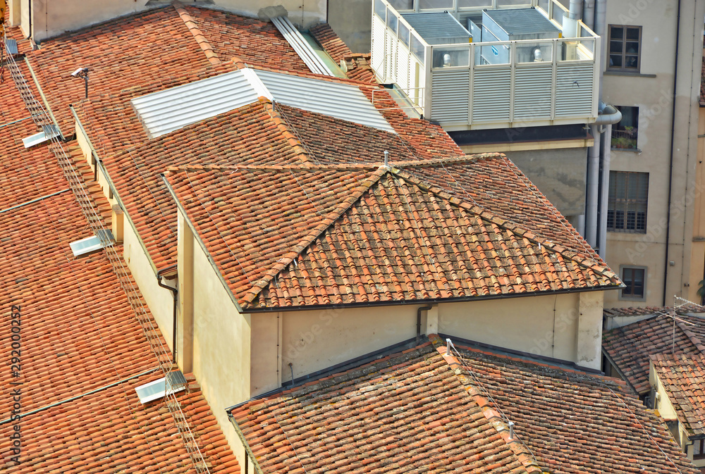 Red tile roof of a modern building. Top view.