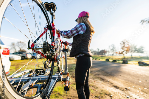 female cyclist preparing for a race photo