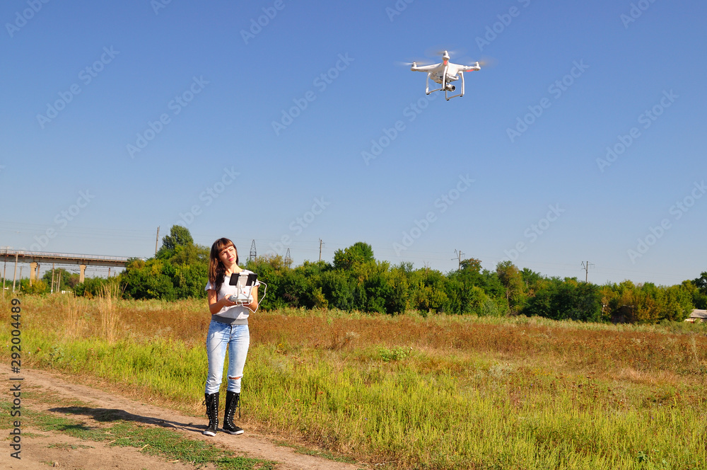 Girl manages quadrocopters field Girl manages quadrocopters field