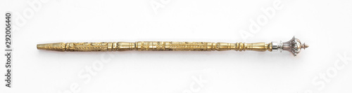 battle golden magic staff on a white background photo