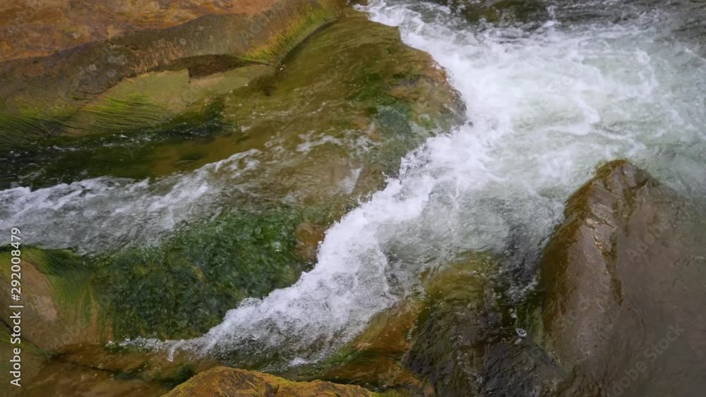 Boiling water of a mountain river in the mountains in summer, large Boiling water of a mountain river in the mountains in summer, large