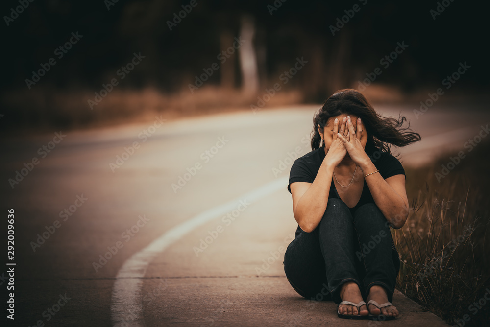 Asian beautiful girl feel alone in the forest,Sad woman concept,Thailand  people,Lady sadness about love from boyfriend,She feeling broken heart  Stock Photo