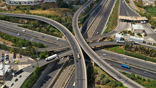 Aerial view of popular highway multilevel junction road, passing through National motorway and Attiki Odos, Attica, Greece