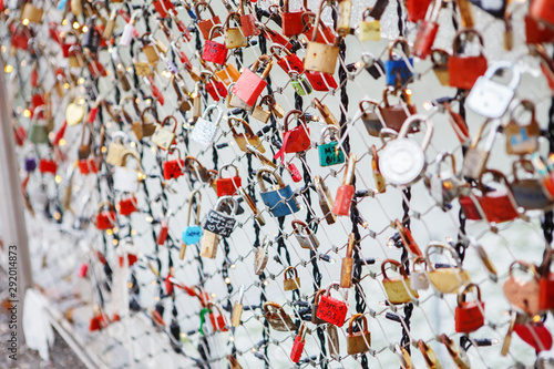 Closeup of love lockers at famous bridge Makartsteg in Salzburg, Austria.