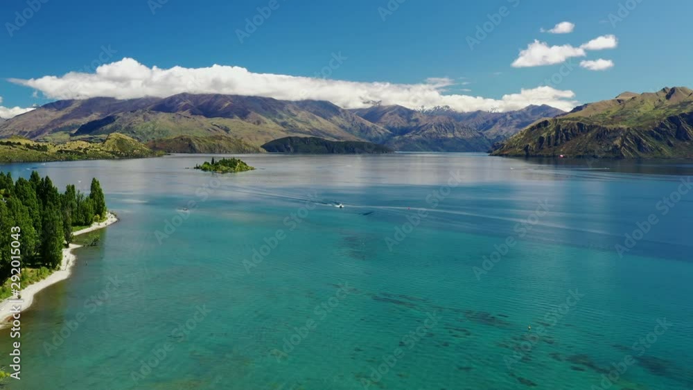 Panoramic view of lake Wanaka with mountains range on the horizon, New Zealand Panoramic view of lake Wanaka with mountains range on the horizon, New Zealand