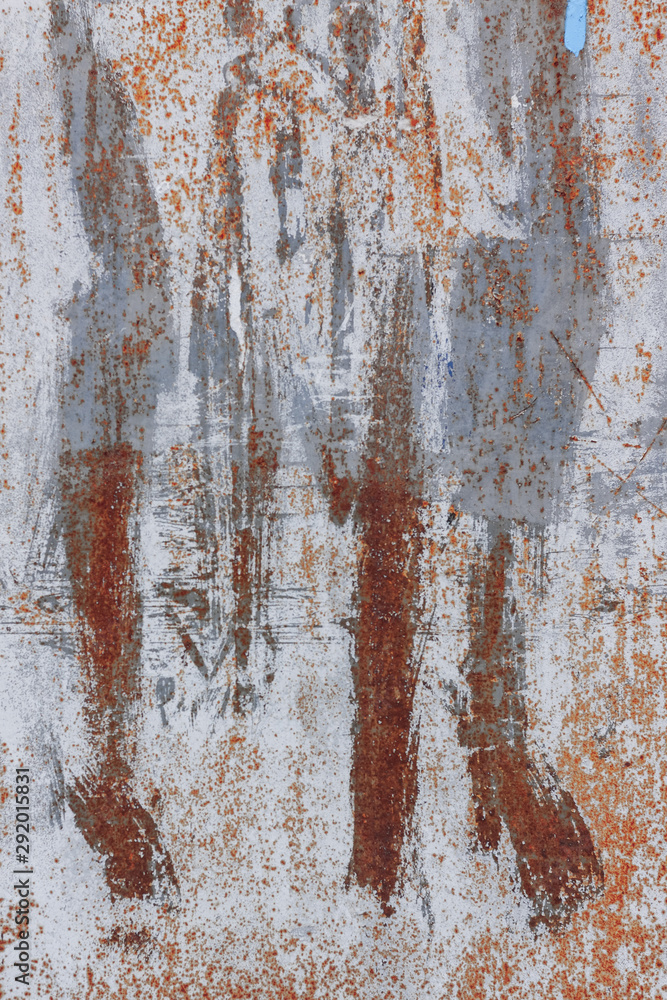 abstract background\rusty metal surface with weathered white paint