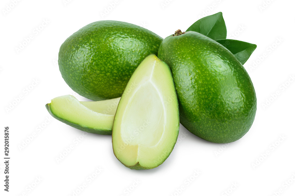 avocado and slice with leaves isolated on white background close-up avocado and slice with leaves isolated on white background close-up