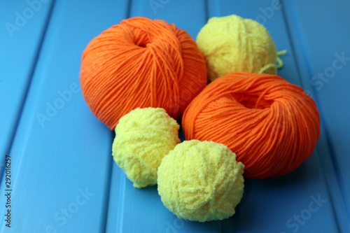 Colorful yarn balls as background, close up