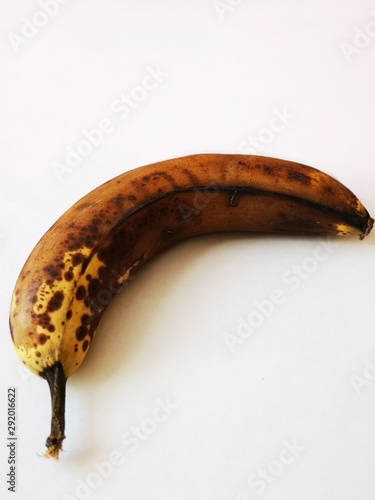 ffaded old banana on white background photo