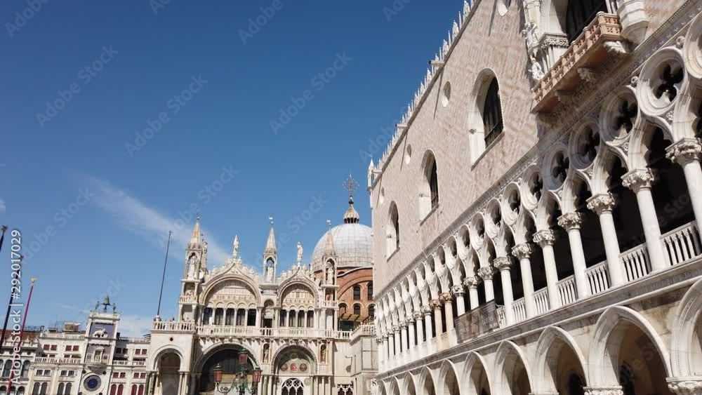 Fixed shot of the Basilica of the Primitive Metropolitan Patriarchal of St. Mark the Evangelist in square San Marco (Venice, Italy). Sunny day. Fixed shot of the Basilica of the Primitive Metropolitan Patriarchal of St. Mark the Evangelist in square San Marco (Venice, Italy). Sunny day.