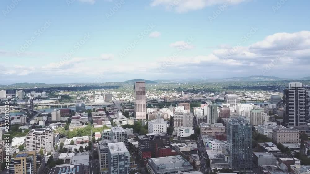 Drone overview city downtown district on a sunny day with blue sky Drone overview city downtown district on a sunny day with blue sky