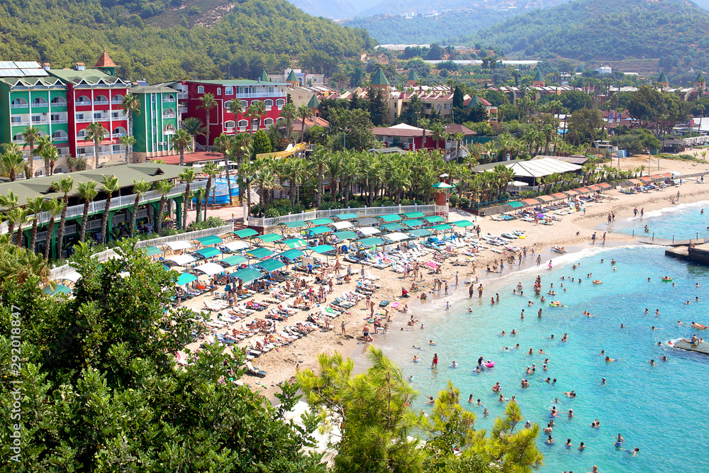 Sunny Alanya beach in Turkey with sea view. Konakli old town View from the fortress on the mountain. Mediterranean Sea