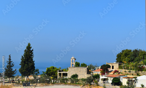 landscape of lebanon, small chapel in a village next to the sea