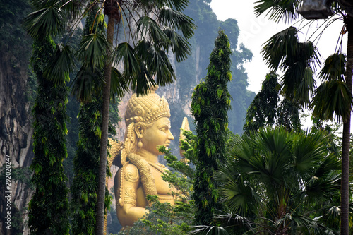 Photography Entrance to Batu Caves with the giant, golden Murugan statue and the 272-step co