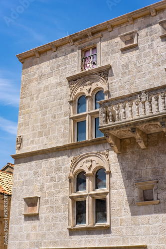 Characteristic stone balcony on old stone house and blue sunny sky in Korcula town  Korcula Island  Dalmatia  Croatia
