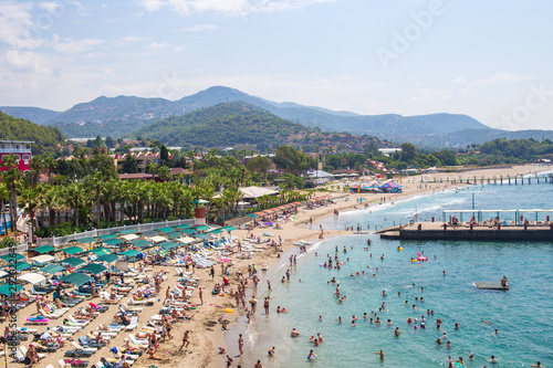 Sunny Alanya beach in Turkey with sea view. Konakli old town View from the fortress on the mountain. Mediterranean Sea photo