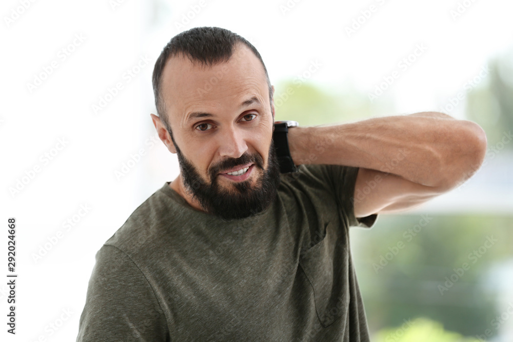 Portrait of handsome mature man on blurred background Portrait of handsome mature man on blurred background