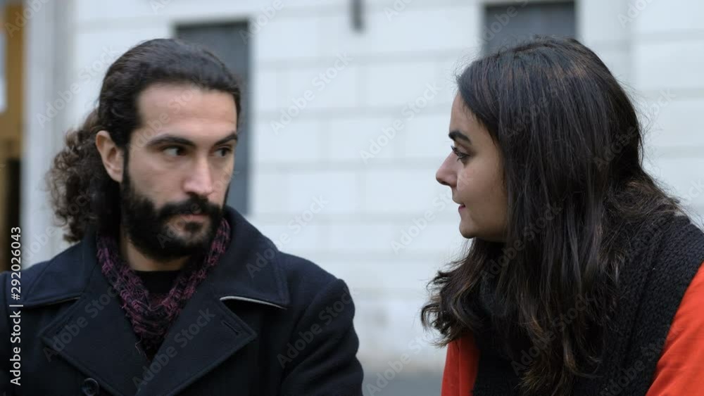aggression, violence .Angry man slapping girlfriend in the street during argue aggression, violence .Angry man slapping girlfriend in the street during argue
